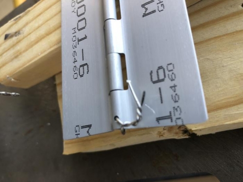 safety wire to retain hinge pin