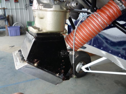 Carb heat control in place with the new tab I fabricated and mounted on the heat box.