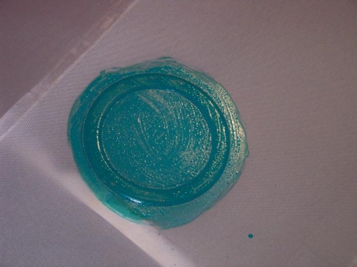 Ring is glued into place, but without the doily glued on.