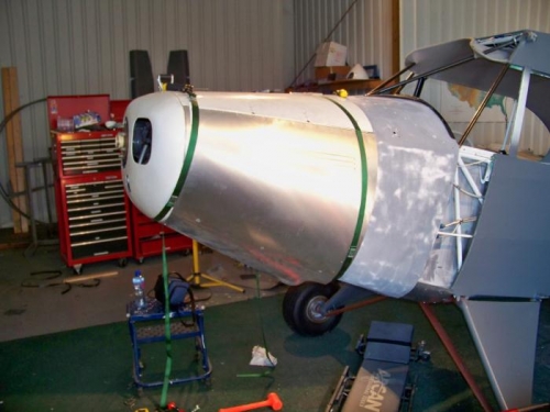The left cowl side piece pulled into place and ready for drilling.