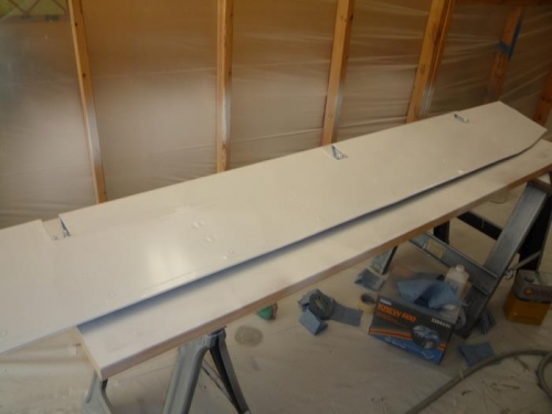 Bottom half of an aileron painted.