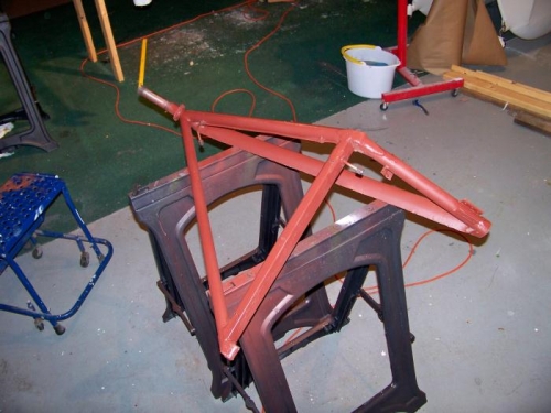 Gear leg cleaned and primed.