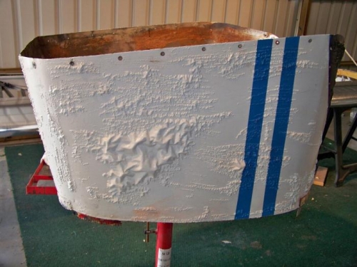 Boot cowl paint being stripped.