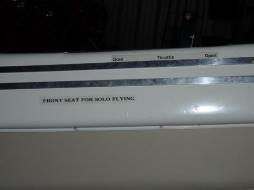 Placards on the left cabin wall.