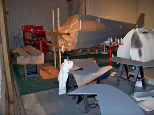 Fuselage and control surfaces  halfway through the priming process.
