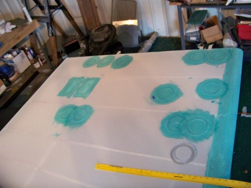 Some of the left wing inspection rings glued into place.