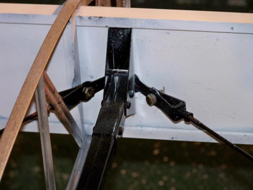 Compression strut and drag/anti-drag wires back in place with new hardware installed.