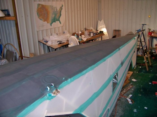 First half of first cross coat on fuse bottom