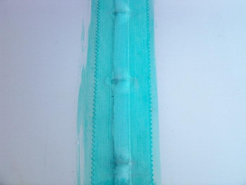 Close-up of the rib taping.