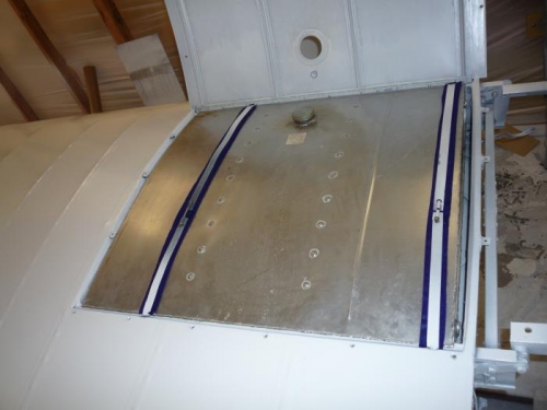 Tank in place with new bolts and strap pads.