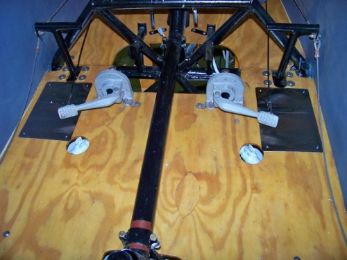 Master cylinders mounted at the rear brake position.