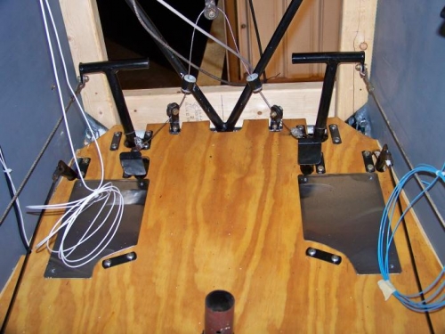 Front brake pedals hooked up to the master cylinders. Note stainless steel heel pads.