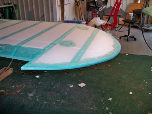 The wing tip is finished, meaning the fabric work on the wing is finished.