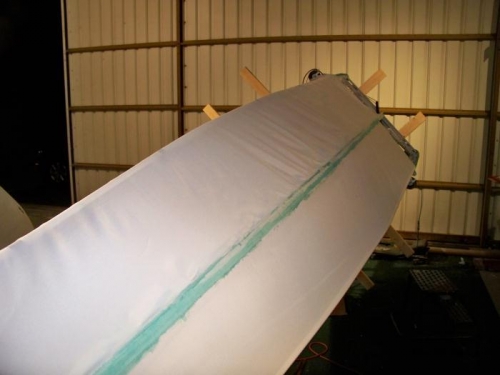 Center top stringer seam glued down & ready for shrinking.