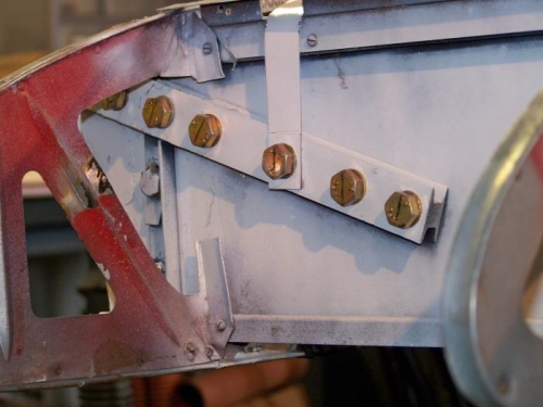 Main spar attach straps with new hardware installed.