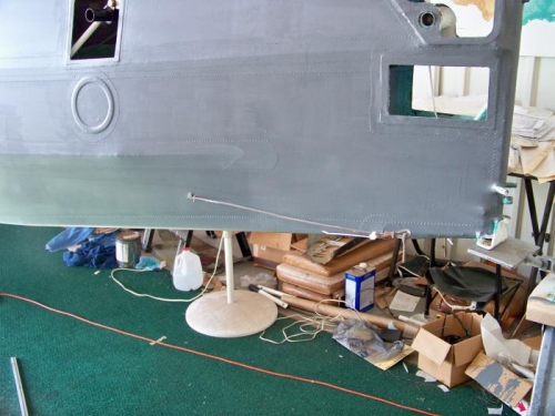 Holes cut for the rudder cable exit points.