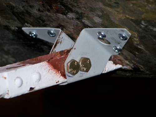 One of the aileron bracket reinforcement plates installed.