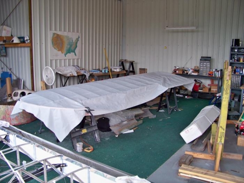 Fabric laid out for the left wing top.