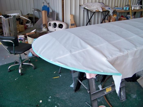 Wing tip bow area trimmed and glued.