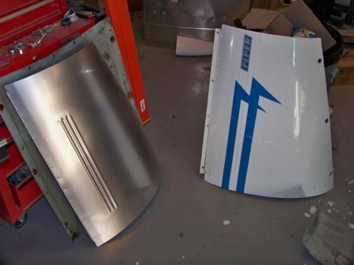 New vs. old side cowling piece.