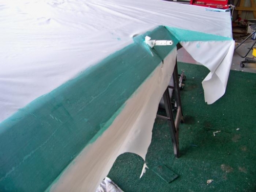 The aileron bay with its fabric glued down and ready for trimming.