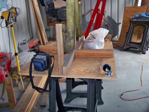 Installing casters on the stand plates.