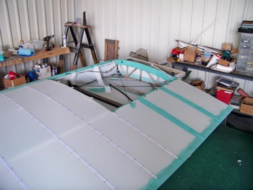 Starting the rib taping on the left wing.