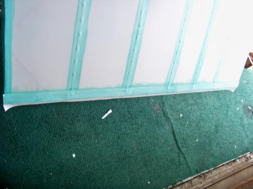 Trailing edge taping glued to the top side.