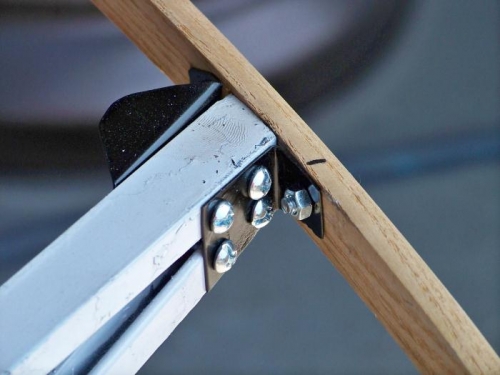 One of the attach bracket assemblies with new hardare installed.