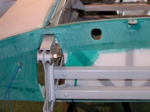 Fuel vent line hole in the right wing root.