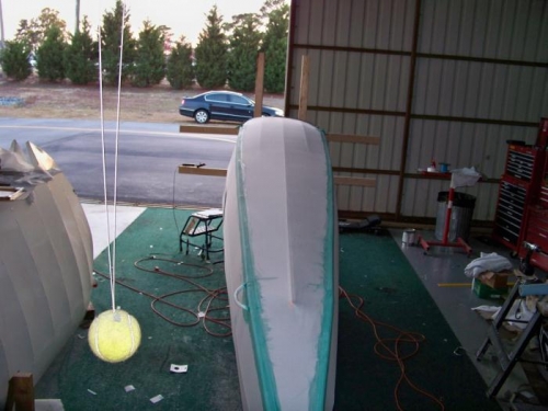 Both bottom longeron tapes installed.