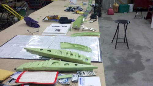 all the components for the ailerons on the table