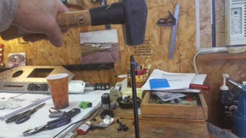 Heat the push rod and install the new end with a good whack.