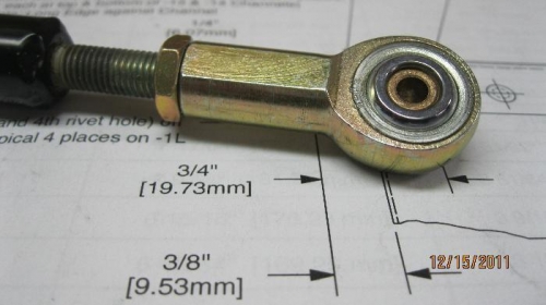Press fit bushing into rod end bearing.