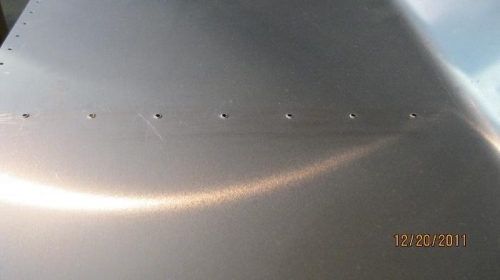 Leading edge skin dimples.