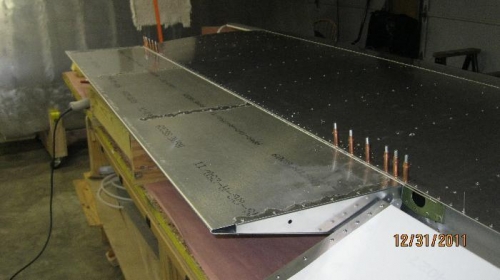 Flap fitted to hinge and rear spar.