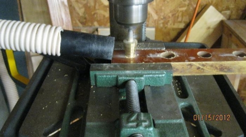 Drilling the fairleads and needed a vac to capture the dust from the phenolic block.