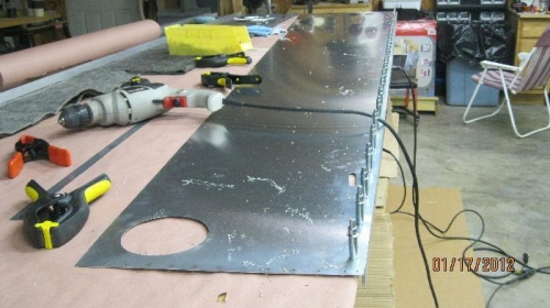 Right lower longeron clecoed to side skin.