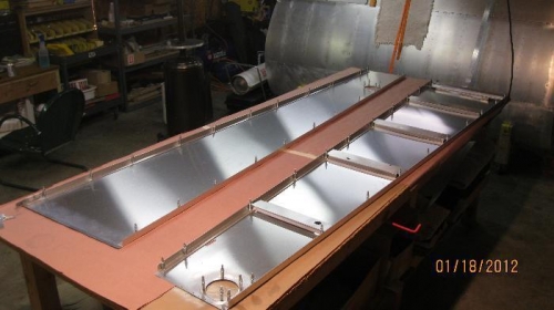 Both aft fuselage skins with upper and lower longerons clocoed.