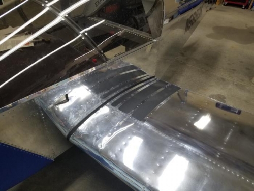 Wing walk riveted with anti-slip pads installed.