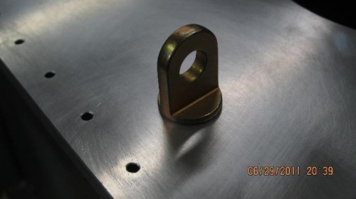 Tie-down bolt on top of skin. Plans are to cut skin around eyebolt.