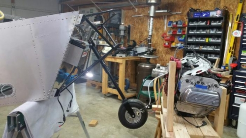 Engine off Remove nose gear to install pant.