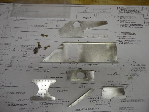 Left wing spar parts ready for deburring.