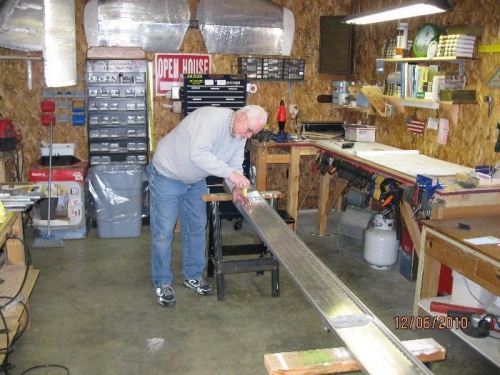 Deburring holes on main spar.