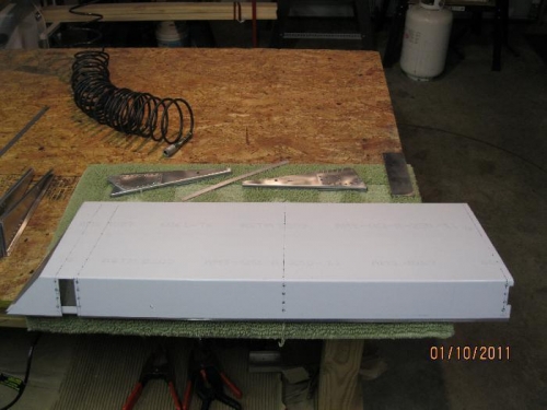 Pilot drilled Aileron skin.