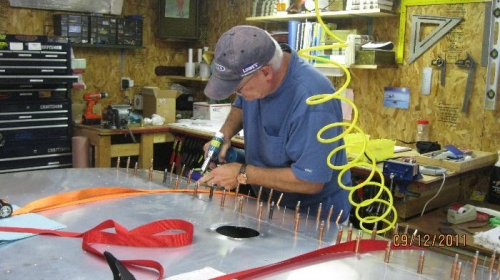 Riveting the bottom of leading edge.