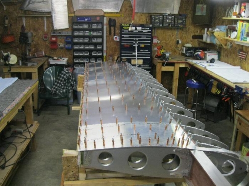 Updrilled Top Wing Skin, Wing Walk Doubler, and Aileron Hinge Half.