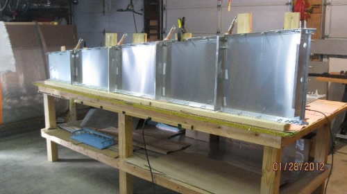 Position and drilled vertical zees.