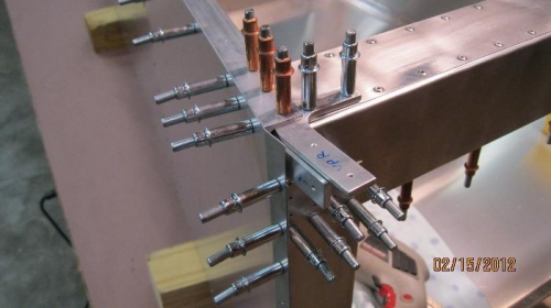 Cross tie box attached to skins, splice plates and verticals.