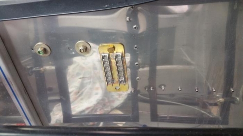 Grounding block inside of firewall.